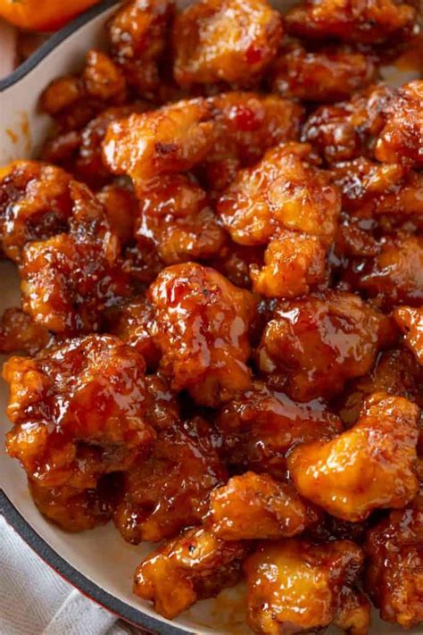 Pour orange chicken sauce over the browned chicken pieces. Healthier EASY! Baked Orange Chicken - Dinner, then Dessert