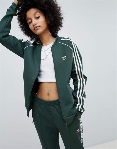 adidas adicolor three stripe track jacket in green adidas tracksuit women adidas women