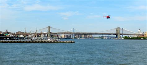 A View Of Brooklyn And Manhattan Bridges From The Staten Island Ferry
