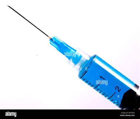 Blue Syringe With Hypodermic Needle On Whitebackground Stock Photo Alamy