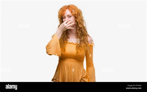 Young Redhead Woman Smelling Something Stinky And Disgusting Intolerable Smell Holding Breath