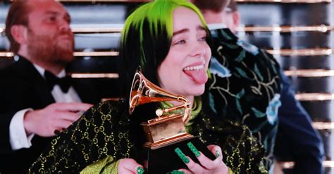 Billie stood on the roof of a car for her performance while her bro was atop a platform. Billie Eilish Makes Grammys History By Taking Out The 'Top Four' Awards