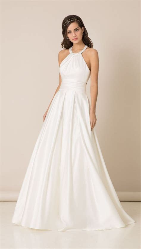 This Satin Ballgown Works Wonderfully With A Subtle Halter Neck To Offer A Timelessly Satin
