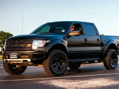 Black Ford F-150 Raptor. My next truck! Hopefully. LOL ...