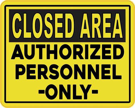 A Yellow And Black Sign That Says Closed Area Authorized Personnel Only