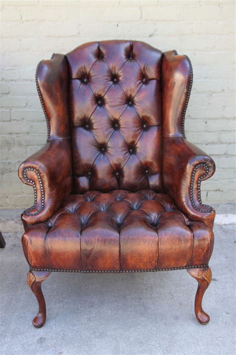 Deep oned red leather wing chair seating andy thornton. Pair of French Leather Tufted Wingback Chairs at 1stdibs