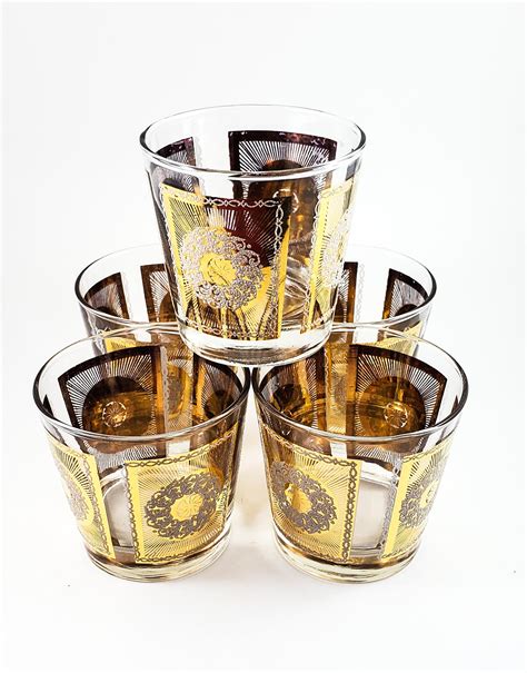 Awesome Vintage Mid Century Gold Embossed Whiskey Glasses With White Glitter Wreath In The Center
