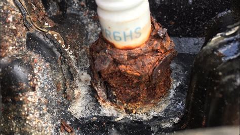 When a spark plug wire is aged or to remove the boot properly: Broken spark plug extraction - YouTube
