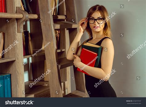 Young Woman Librarian Glasses Posing Book Stock Photo 410273737