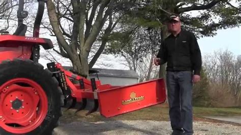 If it's a sharp slope over a small section of land, consider adding some garden steps! Land Pride Grader Scraper: The Driveway Tool - YouTube