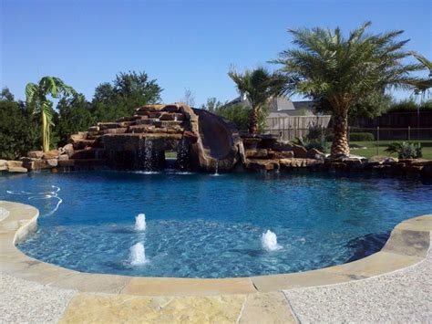 Freeform Pool With Cave Slid Waterfall Traditional