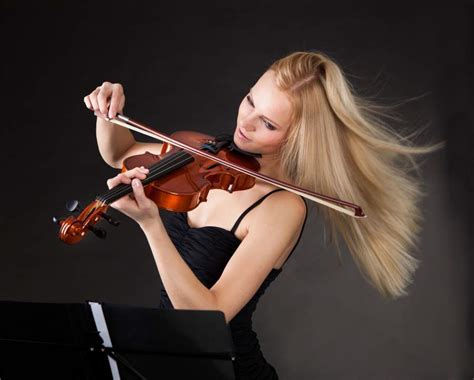 Andrey Popov Young Woman Passionately Playing Violin