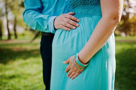 Premium Photo Pregnant Woman And Her Husband Holding Hands On Tummy New Life Theme