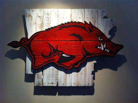 Wooden State Of Arkansas With Razorback Logo Made From Pallet Wood The Products Displayed On