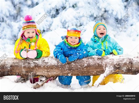 Kids Playing Snow Image And Photo Free Trial Bigstock