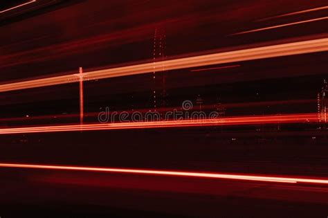 Long Exposure Time Lapse Shot Of A City At Night With Red And White