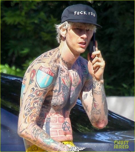 Machine Gun Kelly Shows Off Fully Tattooed Torso While Shirtless Photo