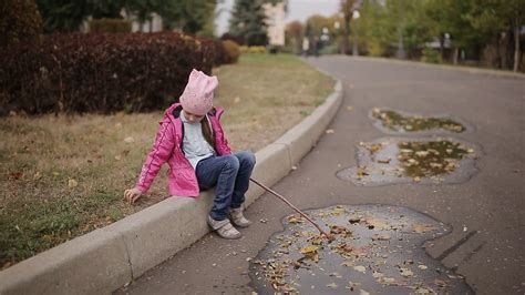 Little Sad Girl Playing Alone In Autumn Stock Footage Sbv 318138327