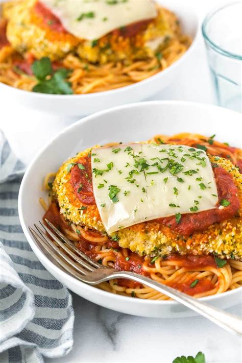 Healthy oven baked chicken parmesan is crispy on the outside and tender on the inside with no frying required. This easy baked chicken parmesan recipe can be made in the oven. It's a little bit healthy but ...