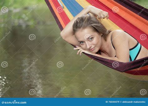 Girl In A Bathing Suit Lying In A Hammock Over The Water Stock Image Image Of Female Beach