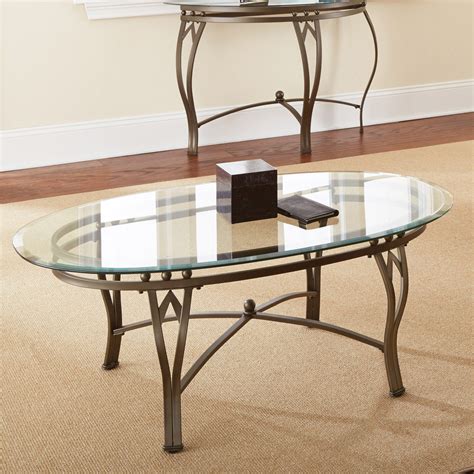 If a tempered glass table top is struck or broken, it will shatter into small, harmless pieces rather than large, sharp shards of glass. Steve Silver Madrid Oval Glass Top Coffee Table - Coffee Tables at Hayneedle