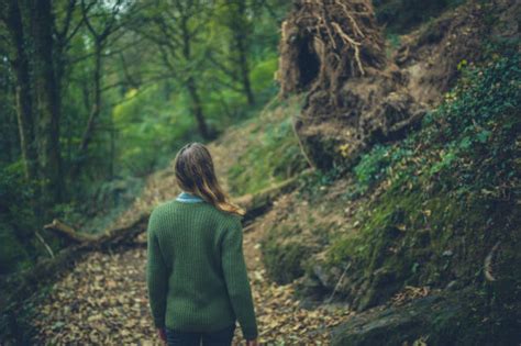 Sad Woman Walking Alone In The Forest Feeling Sad And Lonely Stock