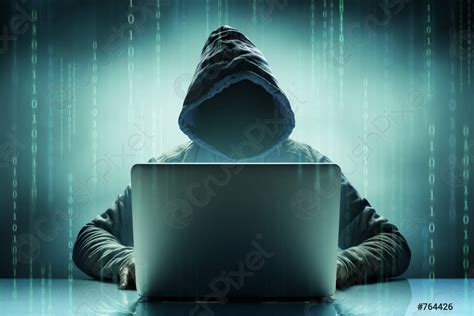 Faceless Anonymous Computer Hacker With Laptop Stock Photo 764426