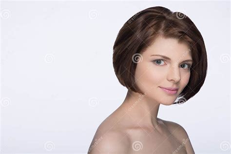 Brunette With Short Hair Looking At Camera On White Isolated Stock