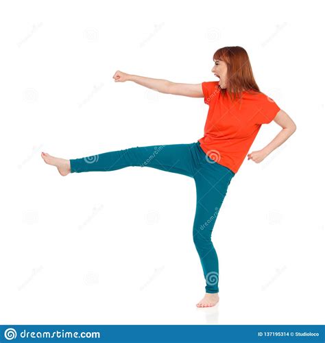 Barefoot Young Woman Is Kicking And Shouting Stock Photo - Image of ...