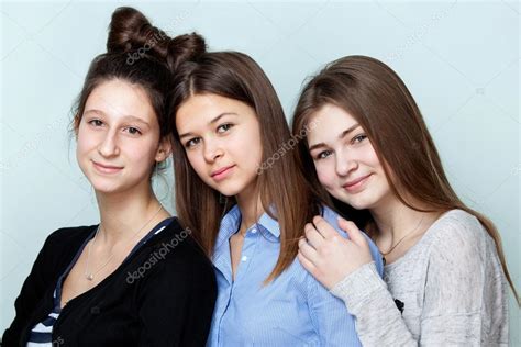 Portrait Of Three Teenage Girls Smiling Stock Photo By ©zdyma4 100486228
