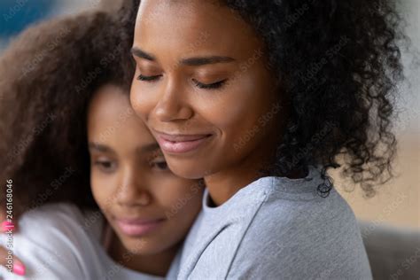 Close Up Of Babe Black Mother Hugging Teenage Babe Fell Love And Affection Caring African