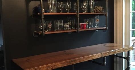 Diy industrial pipe open shelving. DIY Black iron pipe bar top and shelves for BEER storage ...