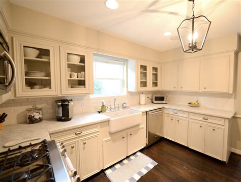 Upgrade to one of these for free: Cream Cabinets - Transitional - kitchen - Cote de Texas