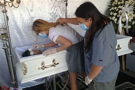 This video shows beautiful women in their funeral caskets! Tragic woman, 20, plans her own funeral so she can fulfil ...