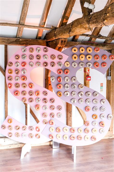 Doughnut Walls To Wow Your Guests Chwv Donut Wall Wedding Donuts