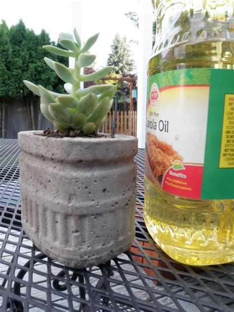 To remove the concrete from the mold, i used a utility knife to cut out the small bucket and to cut away the big bucket. How to make your own concrete planter | The Owner-Builder ...