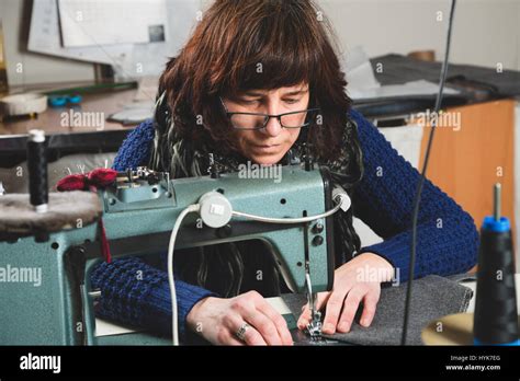 Seamstress Sewing With A Professional Sewing Machine Stock Photo Alamy