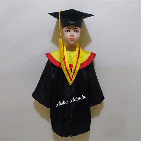 Jual Baju Toga Wisuda Anak Tk Paud Kuning List Merah Kalung Mata Itik