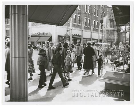 Digital Forsyth People Walking On Sidewalks On West Fourth Street