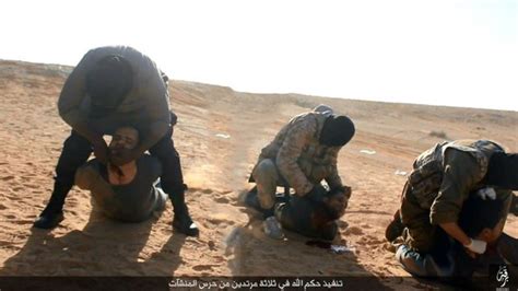 photos isis terror group beheads captured libyan soldiers