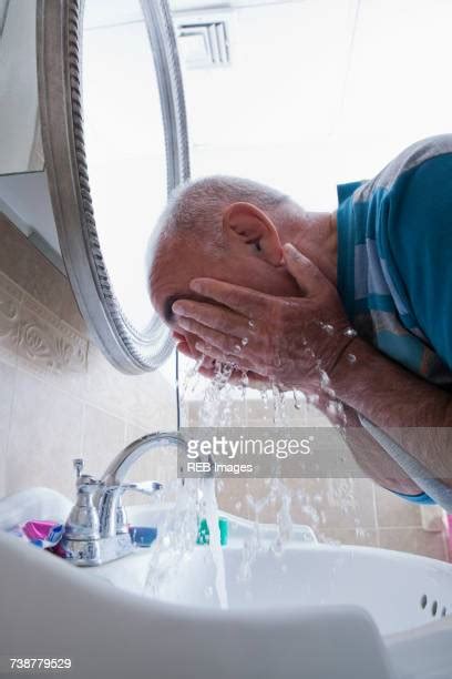 old people showering photos and premium high res pictures getty images