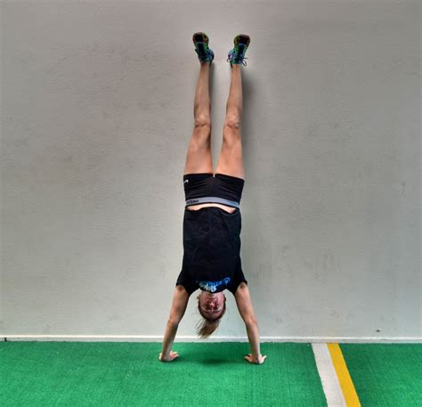 How To Do A Handstand Redefining Strength