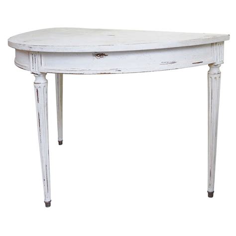Speaking of storage, this table also features a convenience small drawer to store keys or other small items out of sight. French Half Round Console Table at 1stdibs