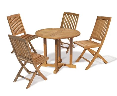 Outdoor arm chair an excellent piece for enhancing country outdoor areas. Canfield 4 Seater Teak Round Garden Table and Folding ...