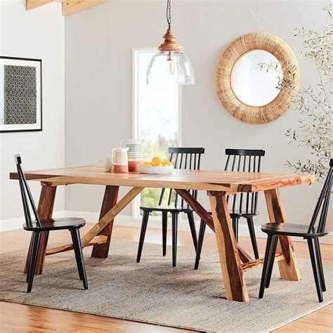 Dining tables are hot spots even when there's no food on them. 51 Farmhouse Dining Tables that are Overflowing with Rustic Charm