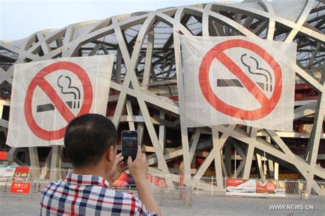 1 in 3 public places in beijing violate smoking ban in first week[1] cn