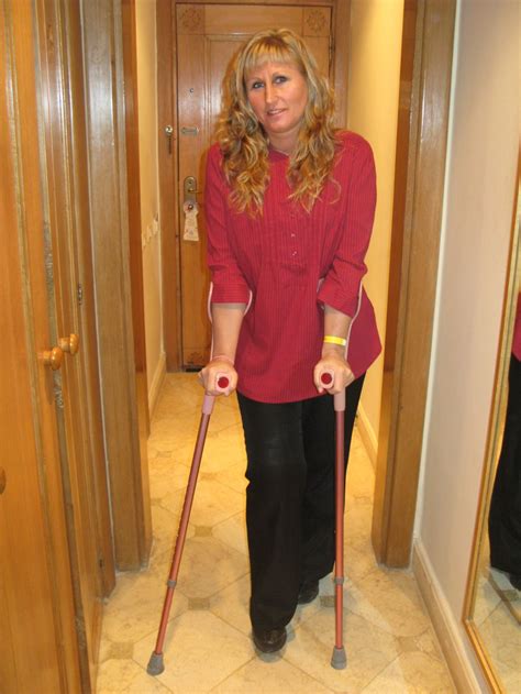 Woman On Crutches Mobility Aids Crutches Wheelchairs Red Leather