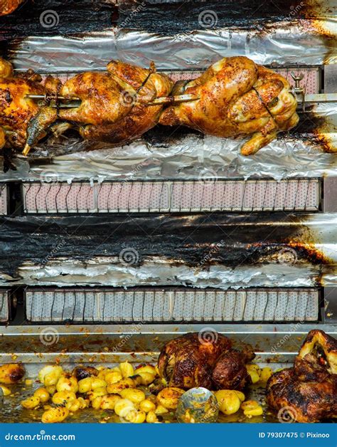 Roasting Chickens On A Rotisserie At A Market Stock Image Image Of