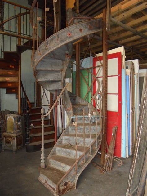 Weland spiral staircases consists of four main components, railings, handrail, stair treads and landings. Industrial iron spiral staircase - Piet Jonker