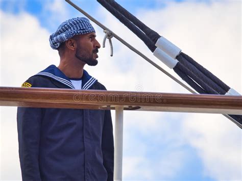 Attractive Crew Member On The Top Deck Of A Cruise Ship Schooner At